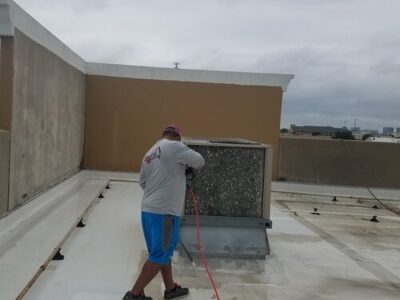 Brandon Cleaning The Roof Before We Start The Coating Process